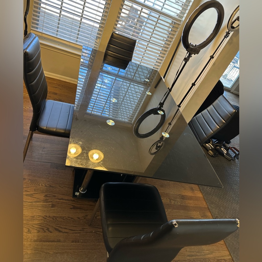 Black glass table with 4 chairs